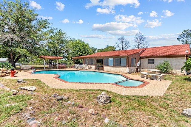 view of pool with a patio