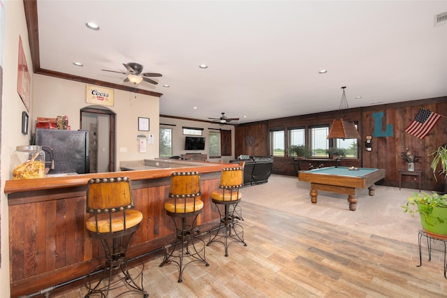 kitchen with black fridge, ceiling fan, light colored carpet, pool table, and pendant lighting