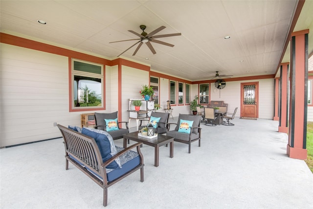 view of terrace featuring outdoor lounge area and ceiling fan