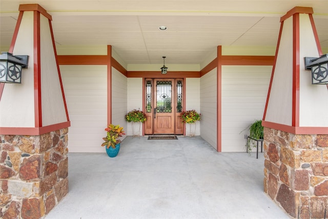 entrance to property with a porch