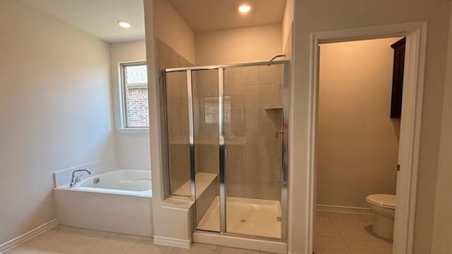 bathroom with toilet, shower with separate bathtub, and tile patterned floors