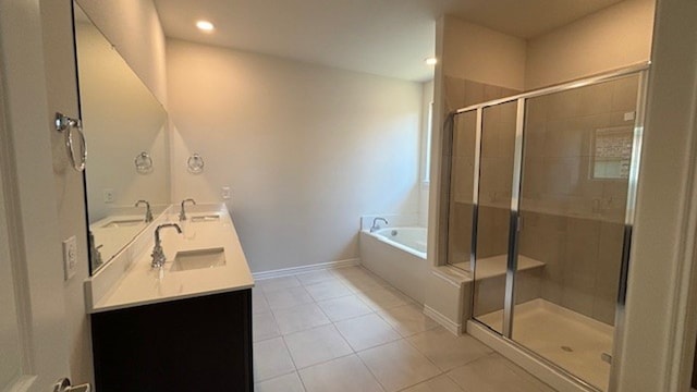 bathroom featuring vanity, tile patterned floors, and plus walk in shower