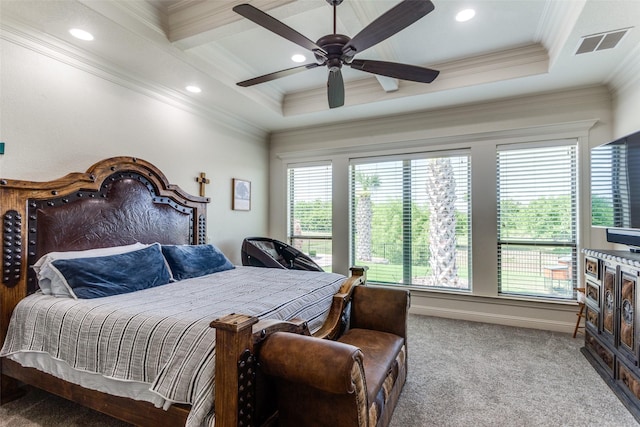 carpeted bedroom with ceiling fan and ornamental molding