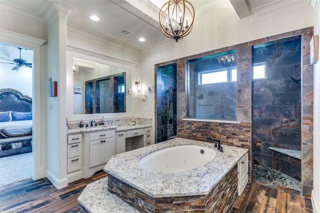 bathroom with crown molding, hardwood / wood-style floors, a healthy amount of sunlight, and shower with separate bathtub