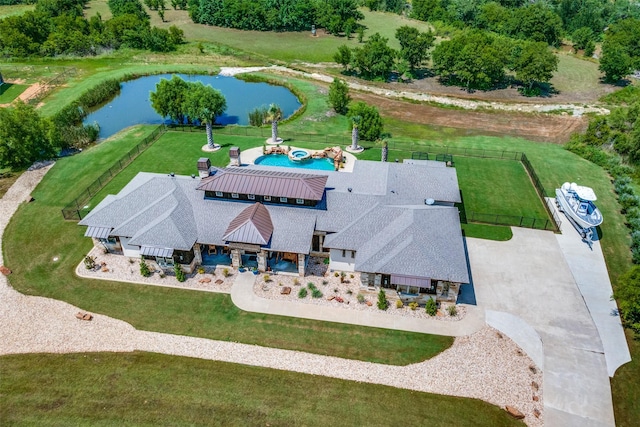 drone / aerial view featuring a water view