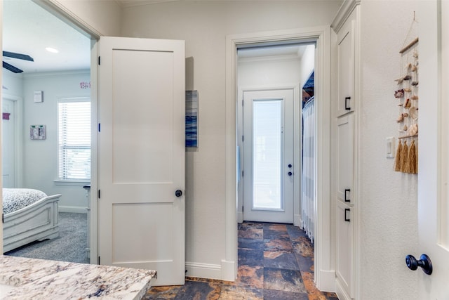 hallway with crown molding