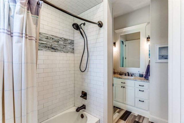 bathroom with vanity, hardwood / wood-style flooring, and shower / tub combo with curtain