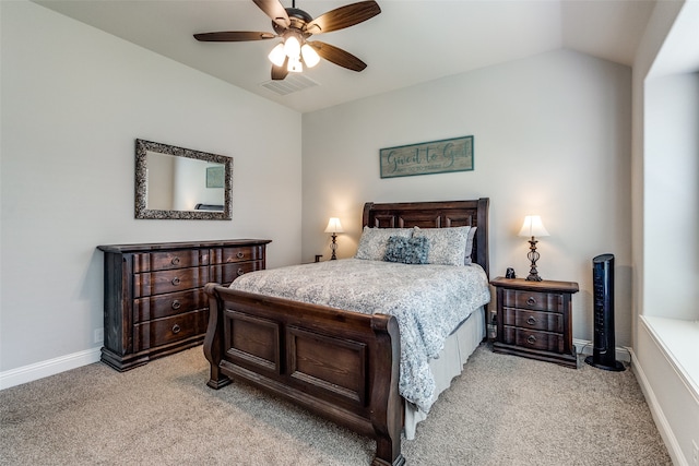 carpeted bedroom featuring ceiling fan and lofted ceiling