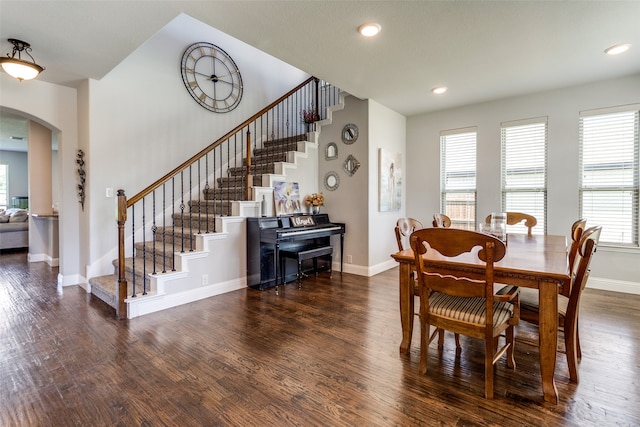 dining space featuring dark hardwood / wood-style flooring