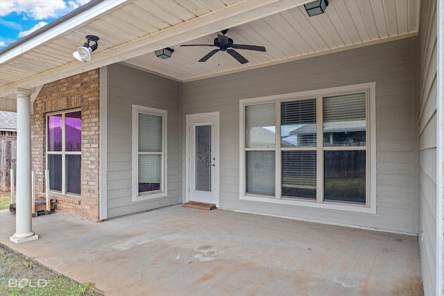 view of patio featuring ceiling fan