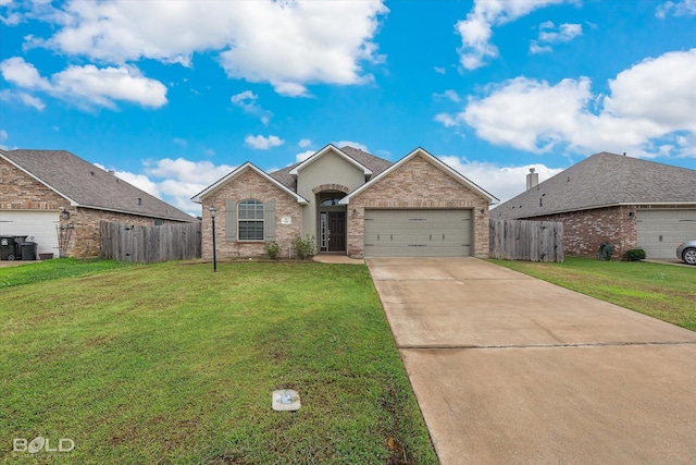 ranch-style house featuring a garage and a front lawn