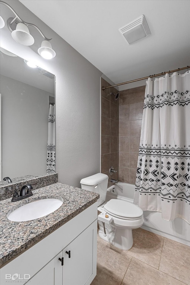 full bathroom featuring shower / tub combo, vanity, tile patterned floors, and toilet