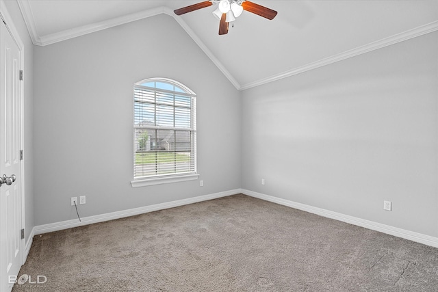 unfurnished room featuring vaulted ceiling, ornamental molding, carpet, and ceiling fan