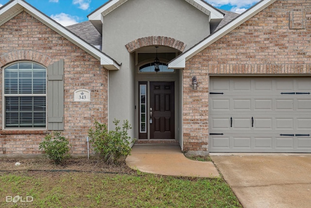 property entrance with a garage