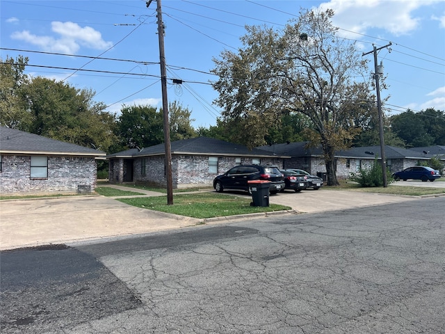 view of property exterior featuring a yard and central AC unit