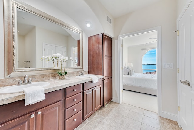 carpeted bedroom with ceiling fan, a water view, crown molding, and access to outside