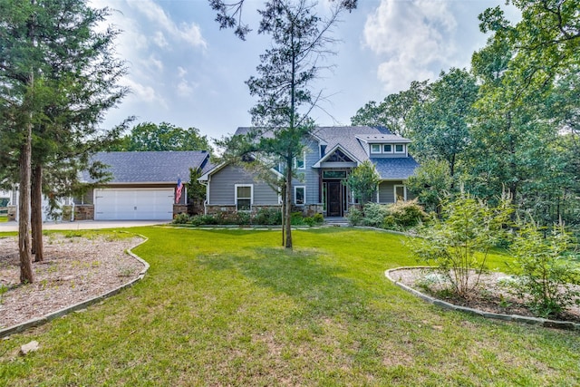 craftsman house featuring a garage and a front yard