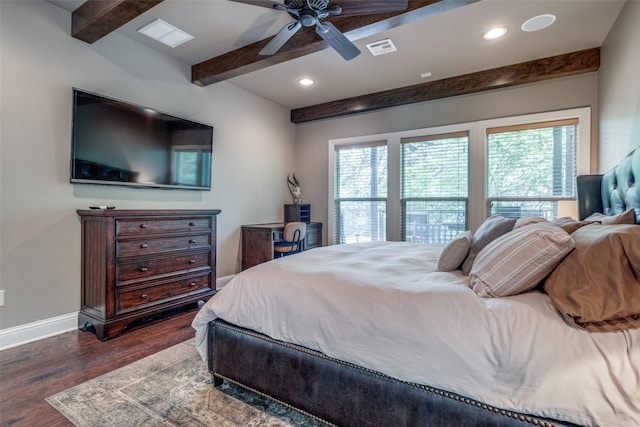 bedroom featuring beam ceiling, ceiling fan, and dark wood-type flooring