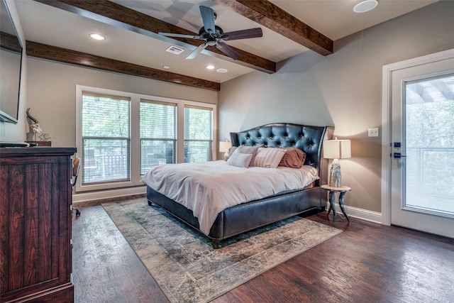 bedroom with hardwood / wood-style floors, ceiling fan, and beamed ceiling