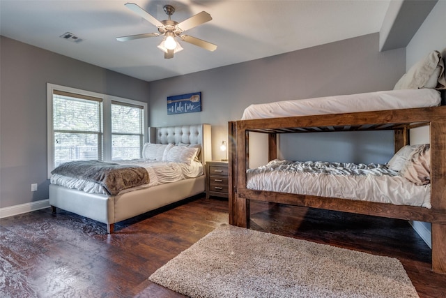 bedroom featuring ceiling fan and dark hardwood / wood-style floors