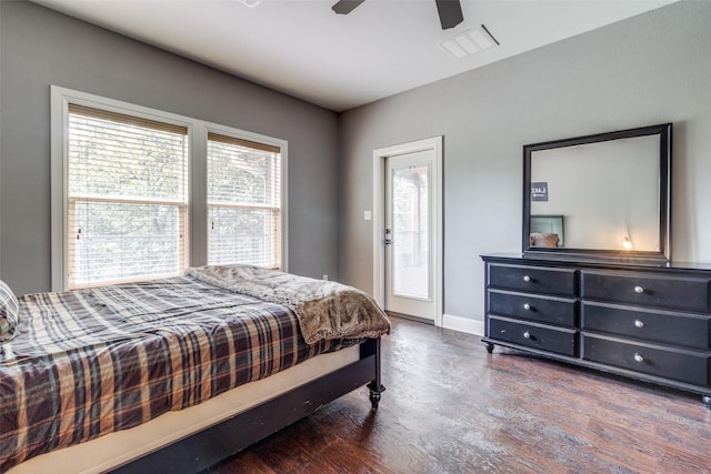 bedroom featuring ceiling fan and dark wood-type flooring