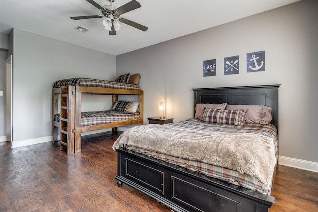 bedroom featuring ceiling fan and dark hardwood / wood-style flooring