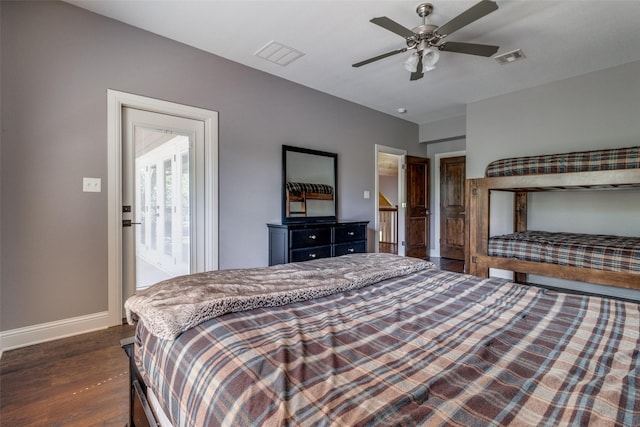 bedroom featuring ceiling fan and dark wood-type flooring