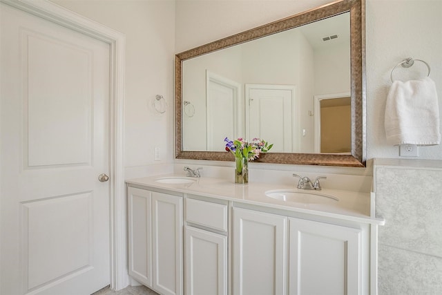 bathroom featuring vanity