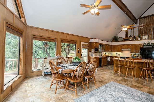 dining area featuring a wealth of natural light, beam ceiling, ceiling fan, and light tile floors