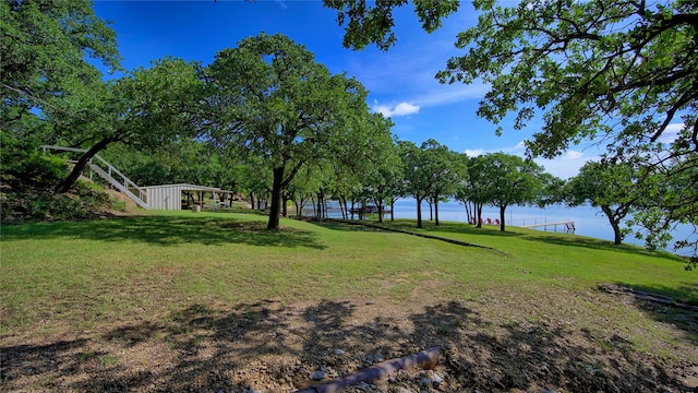 view of yard with a water view