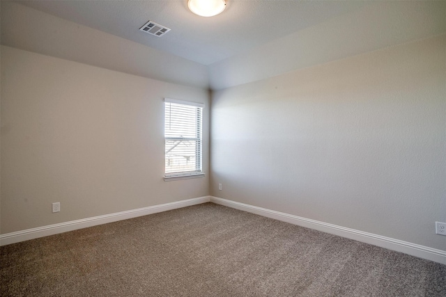 spare room with carpet