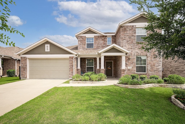 craftsman inspired home with a front lawn and a garage