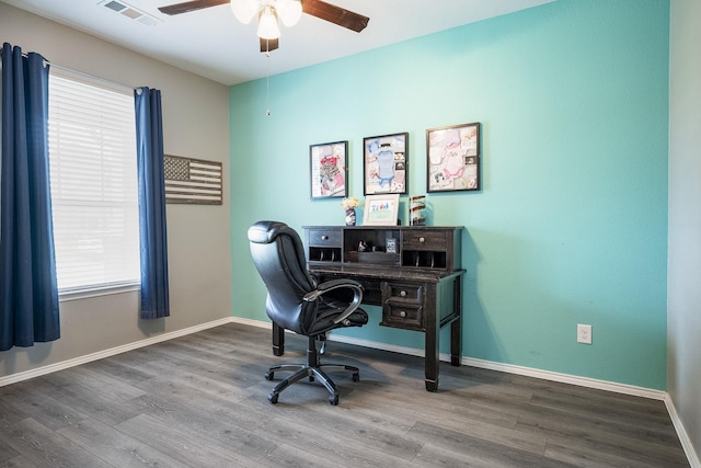 office space with ceiling fan and hardwood / wood-style floors