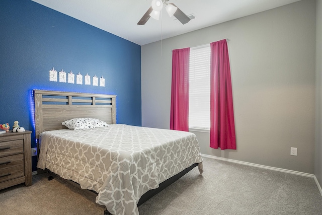 carpeted bedroom featuring ceiling fan