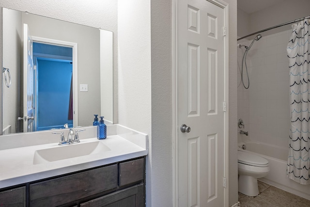 full bathroom featuring shower / bath combo, vanity, toilet, and tile patterned floors