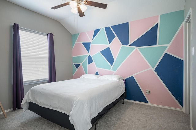 bedroom featuring carpet, ceiling fan, and lofted ceiling