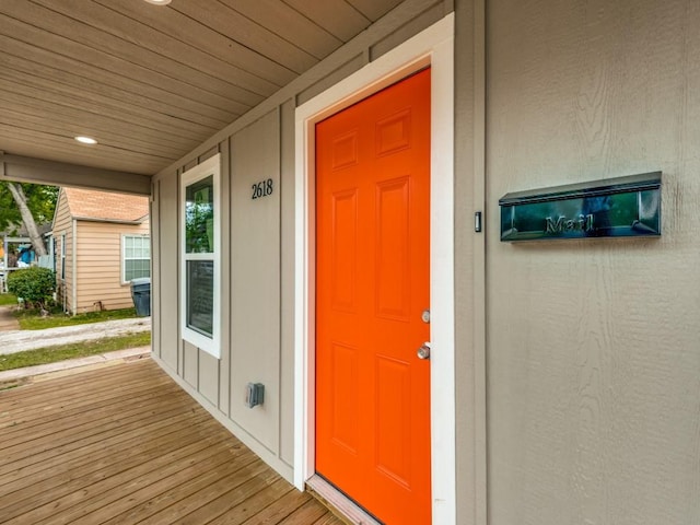 doorway to property featuring a porch