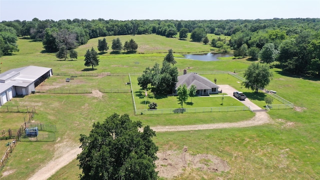 birds eye view of property with a water view and a rural view