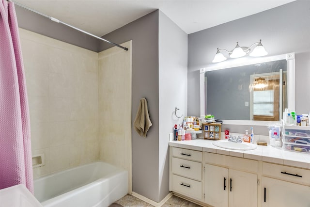 bathroom with tile patterned floors, vanity, and shower / bathtub combination with curtain