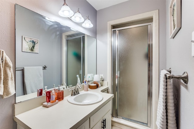 bathroom featuring vanity and walk in shower