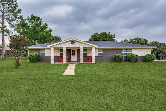 ranch-style home with a front yard