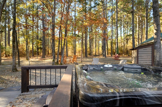 exterior space with a hot tub