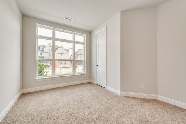 empty room with light carpet