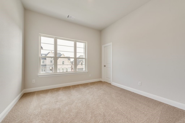 empty room featuring carpet flooring