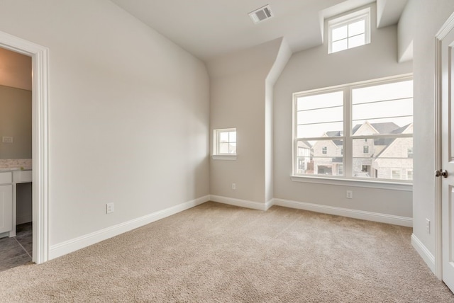 interior space featuring light colored carpet