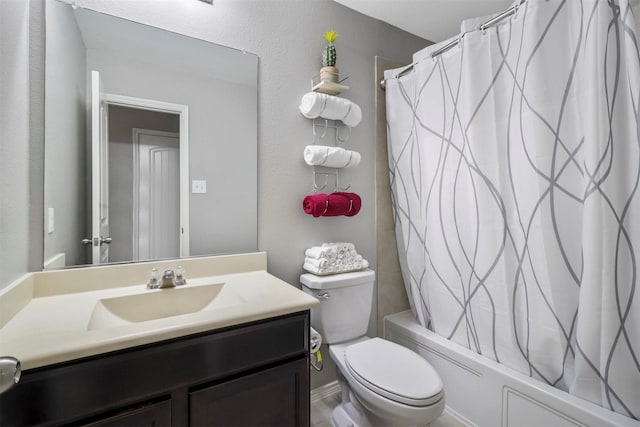 full bathroom featuring vanity, toilet, and shower / tub combo