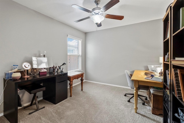 office space with carpet floors and ceiling fan