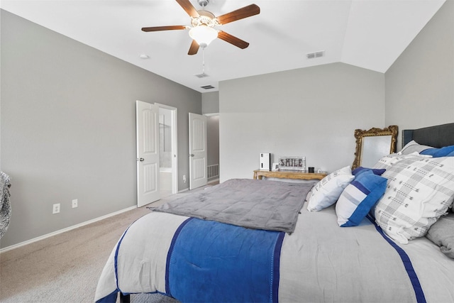 carpeted bedroom featuring vaulted ceiling and ceiling fan