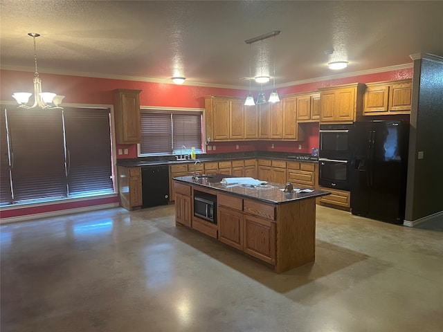 kitchen with a textured ceiling, ornamental molding, black appliances, pendant lighting, and a center island