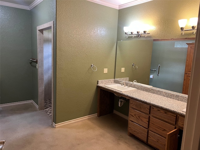 bathroom with vanity, a shower, and ornamental molding